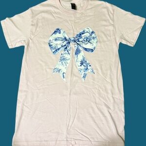 Cream T-Shirt with Blue Bow Design